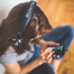 woman-with-headphones-listening-music-6399